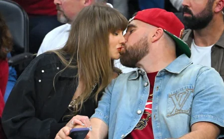 Travis Kelce Displays Pretty Man Poster at New Heights Live Show — Taylor Swift Travis Kelce Cameo