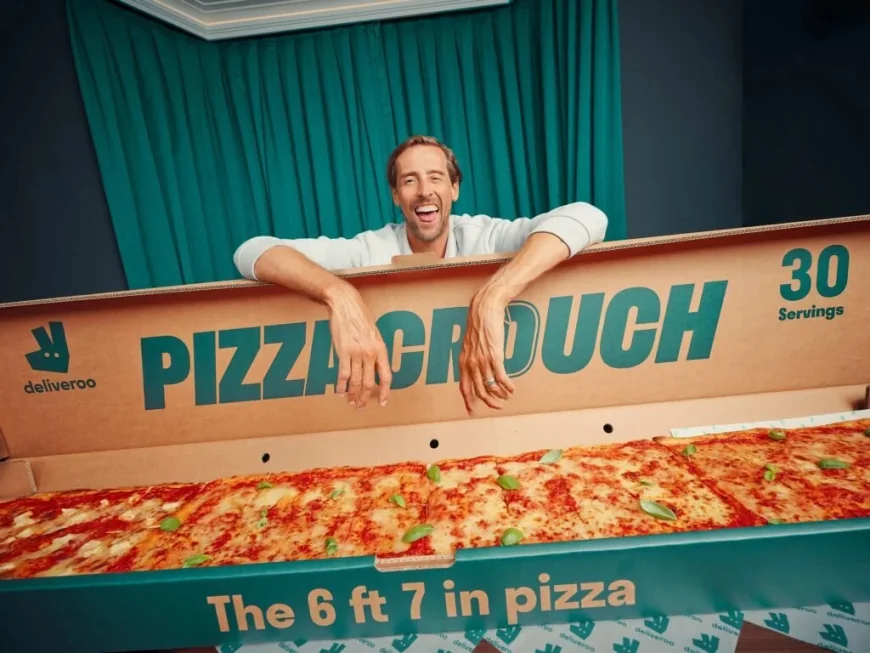 Abbey Clancy joins Deliveroo in 6ft 7in Pizza Crouch push