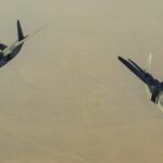 طائرتان مقاتلتان تابعتان للتحالف الدولي تقترب من طائرتين مقاتلتين روسيتين فوق جنوب سوريا